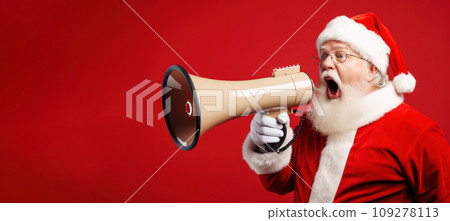 Santa Claus with megaphone on red background. 109278113