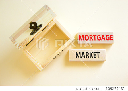 Mortgage market symbol. Concept words Mortgage market on beautiful wooden blocks. Beautiful white table white background. Empty beautiful wooden chest. Business mortgage market concept. Copy space. 109279481