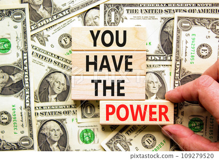 You have the power symbol. Concept word You have the power on beautiful wooden block. Dollar bills. Beautiful background from dollar bills. Business motivational you have the power concept. Copy space 109279520