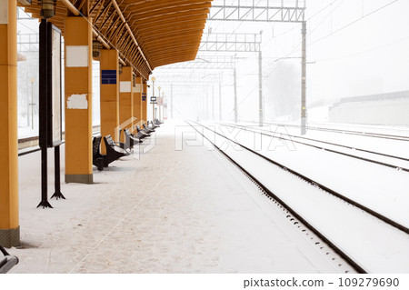 Train station in a snowstorm close up Train station in a snowstorm close up 109279690