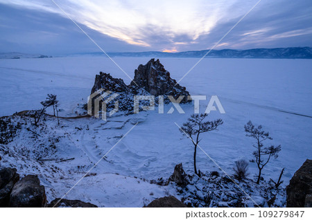 Shamanka Rock. sunset. Olkhon Island. snowy and frosty winter. Shamanka Rock. sunset. Olkhon Island. snowy and frosty winter. 109279847