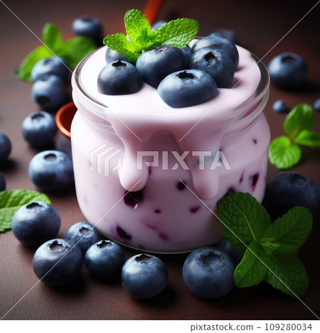 Blueberry yogurt served with fresh blueberries and mint leaves Blueberry yogurt served with fresh blueberries and mint leaves 109280034