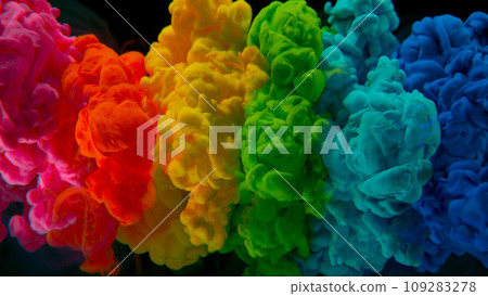 Abstract background, colorful liquid pouring isolated on black background, freeze motion 109283278