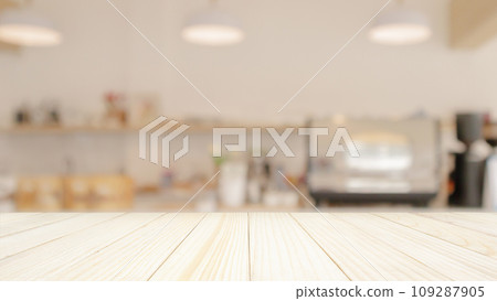 Empty wood table top with cafe restaurant interior blur background 109287905