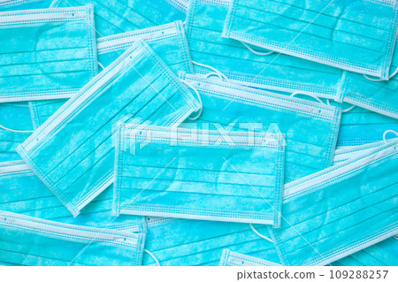 Blue surgical face mask texture background protection against air pollution and COVID-19 coronavirus. Healthcare and medical concept 109288257