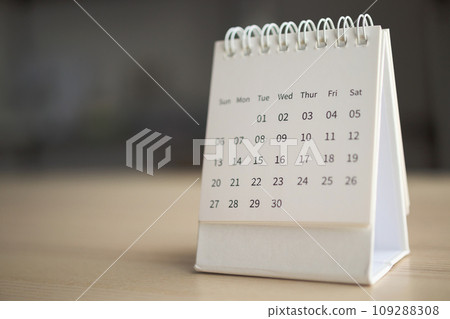 Calendar page close up on wood table background business planning appointment meeting concept Calendar page close up on wood table background business planning appointment meeting concept 109288308