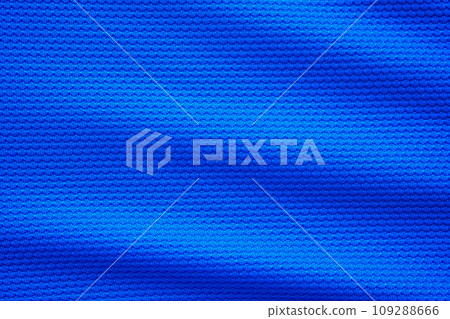 Blue football jersey clothing fabric texture sports wear background, close up top view 109288666