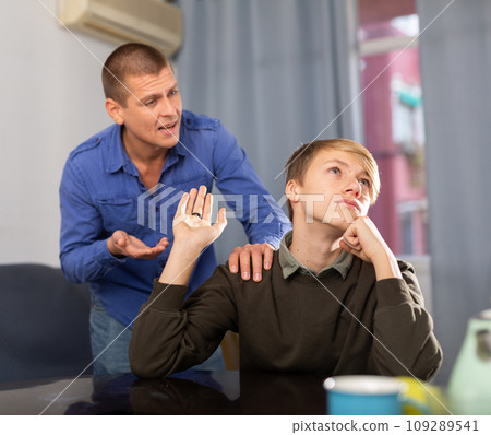 Man and his teenage son offended at each other after quarrel 109289541