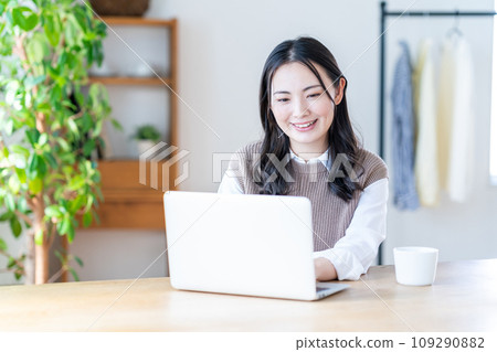 A young woman doing telework. A young woman doing telework. 109290882