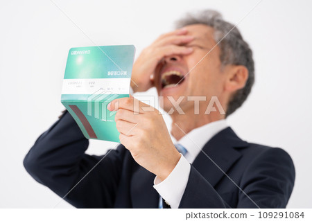 Businessman bankbook laments Businessman bankbook laments 109291084