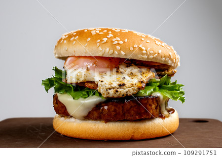 Bacon lettuce egg cheese hamburger plate white background Bacon lettuce egg cheese hamburger plate white background 109291751