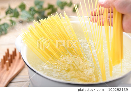Boil the pasta in a pan Boil the pasta in a pan 109292189