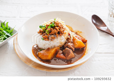 Natto curry topped with cheese Natto curry topped with cheese 109293632
