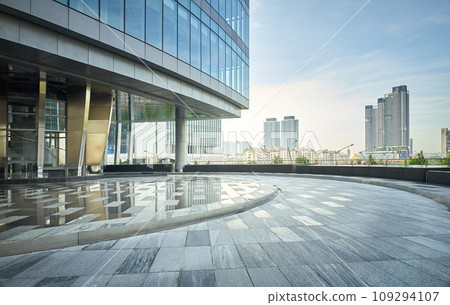 Building exterior with cityscape background 109294107