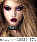 A woman with long blonde hair wearing a choker 109294571