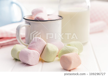 Sweet marshmallows candy on kitchen table. Sweet marshmallows candy on kitchen table. 109296727