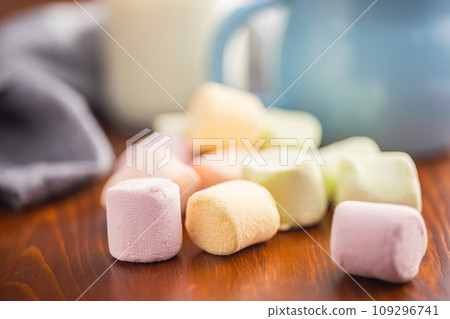 Sweet marshmallows candy on kitchen table. 109296741