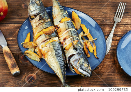 Grilled baked mackerel fish with mango. 109299785