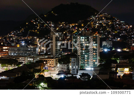 housing community on the hillside in Vitoria, Espirito Santo, Brazil. Night view housing community on the hillside in Vitoria, Espirito Santo, Brazil. Night view 109300771