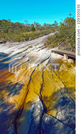 beautiful waterfall in the Ibitipoca State park valley, Minas Gerais, Brazil 109300836