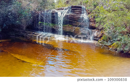 beautiful waterfall in the Ibitipoca State park valley, Minas Gerais, Brazil beautiful waterfall in the Ibitipoca State park valley, Minas Gerais, Brazil 109300838