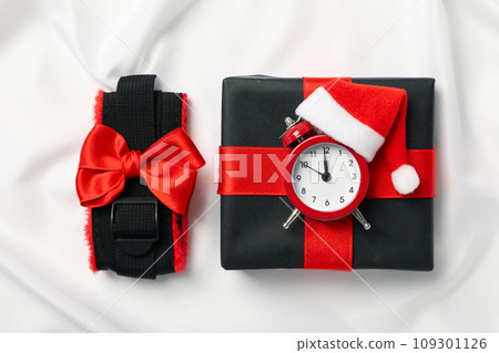 Sex toys with Christmas gifts on the background. 109301126