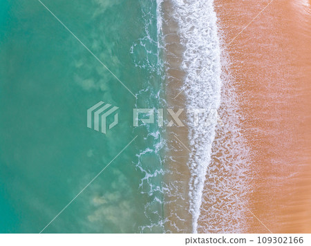 Beautiful waves sea surface in sunny day summer background, Amazing seascape, Top view beach sea background Beautiful waves sea surface in sunny day summer background, Amazing seascape, Top view beach sea background 109302166