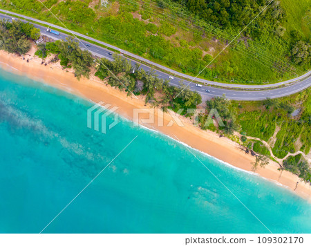 Aerial view seashore with road around the Phuket island Thailand, Beautiful seacoast view at open sea in summer season,Nature and Travel background Aerial view seashore with road around the Phuket island Thailand, Beautiful seacoast view at open sea in summer season,Nature and Travel background 109302170