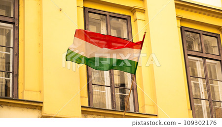 Hungarian flag or flag of Hungary waving in the wind 109302176