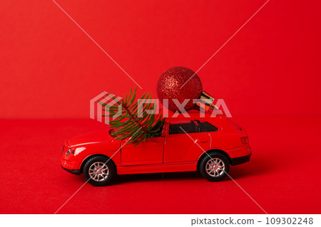 A car with a Christmas tree and New Year's decor. A car with a Christmas tree and New Year's decor. 109302248