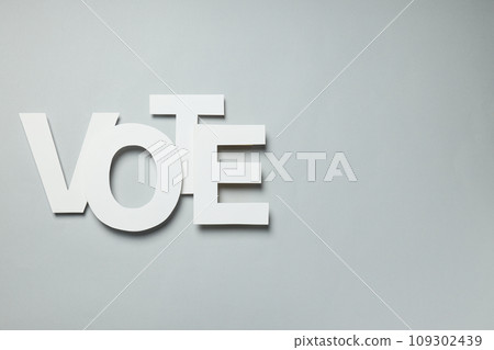 Word Vote on gray background, space for text 109302439