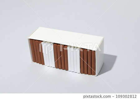 Chocolate bars in a white paper box 109302812