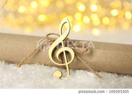 Musical, golden treble clef with a scroll. 109303305