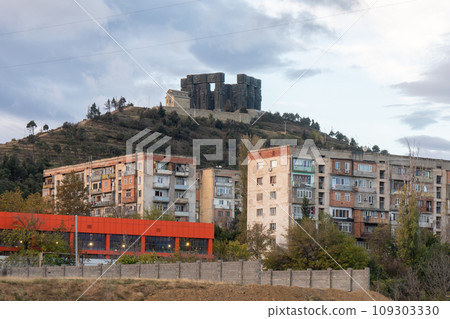 Chronicle of Georgia, hilltop sculpture with vast pillars depicting Georgian history. Tbilisi 109303330