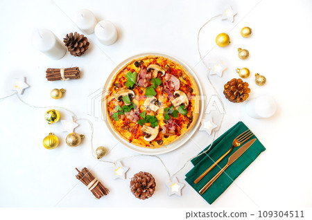 Traditional Christmas or New Year's pie or quiche. 109304511