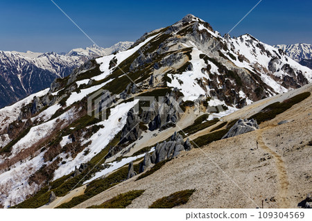 Tsubaku-dake in the Northern Alps with remaining snow seen from near Tsubame-zanso Tsubaku-dake in the Northern Alps with remaining snow seen from near Tsubame-zanso 109304569