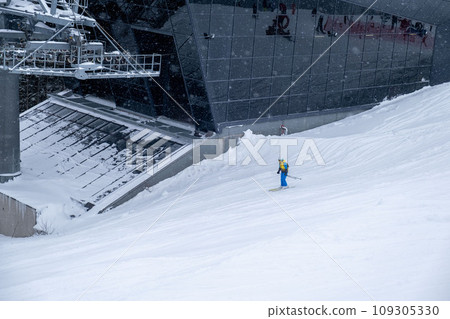 woman skier on the top of the chopok mountain woman skier on the top of the chopok mountain 109305330