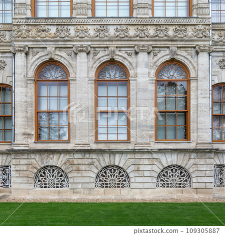 Side wall at Dolmabahce Palace, with three arched windows, Besiktas district, Bosphorus, Istanbul, Turkey Side wall at Dolmabahce Palace, with three arched windows, Besiktas district, Bosphorus, Istanbul, Turkey 109305887