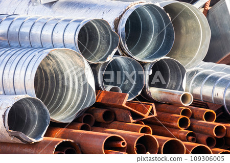 Pile of used metal tubes for air ventilation and water systems Pile of used metal tubes for air ventilation and water systems 109306005