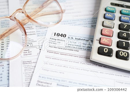 Tax form 1040 U.S. Individual Income Tax Return, business finance concept. Tax form 1040 U.S. Individual Income Tax Return, business finance concept. 109306442