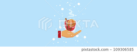 A cup of mulled wine in his hands. 109306585