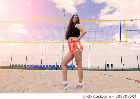 Young, beautiful girl athlete in sportswear is training at the stadium Young, beautiful girl athlete in sportswear is training at the stadium 109308504