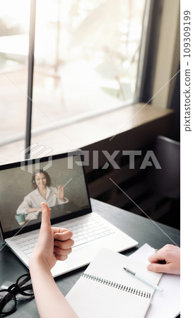 Virtual Meeting. Woman Engaged in Online Discussion or Web Conference. Online Work and Study. Woman Virtual Meeting. Woman Engaged in Online Discussion or Web Conference. Online Work and Study. Woman 109309199