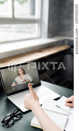 Virtual Connections. Woman Engages in Online Discussion, Work from Home, Freelance, Video Virtual Connections. Woman Engages in Online Discussion, Work from Home, Freelance, Video 109309200