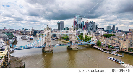 Aerial view over Tower Bridge and River Thames in London Aerial view over Tower Bridge and River Thames in London 109309626