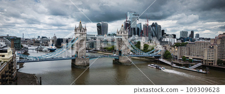 Aerial view over Tower Bridge and River Thames in London Aerial view over Tower Bridge and River Thames in London 109309628