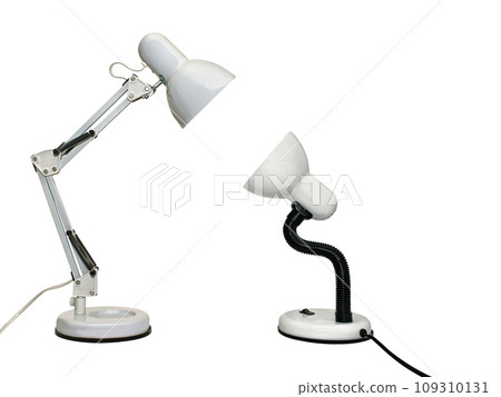 Two table electric lamps shining on each other. Isolated on white background 109310131