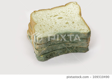 Wasted bread isolated on white. Biodegradable food waste concept. 109310490