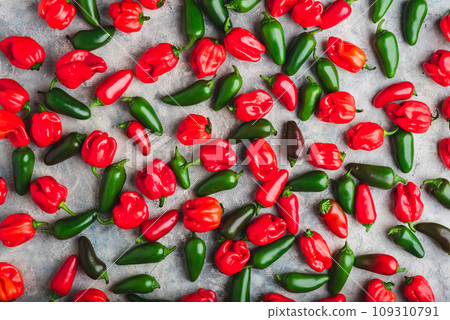 Hot Chili Peppers on Gray Concrete Background 109310791