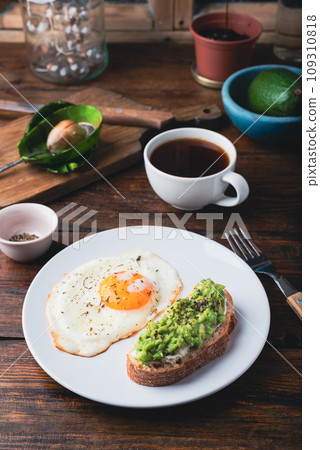 Avocado toast with fried egg Avocado toast with fried egg 109310818